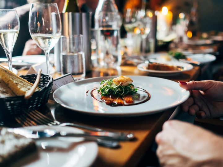 A family meal laid out at a wooden table